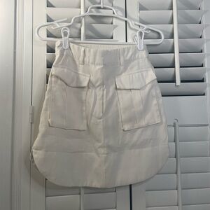 Cream colored cargo utility miniskirt